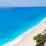 "Aerial view of Egremni Beach Lefkada with turquoise waters and white cliffs"
