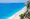 "Aerial view of Egremni Beach Lefkada with turquoise waters and white cliffs"
