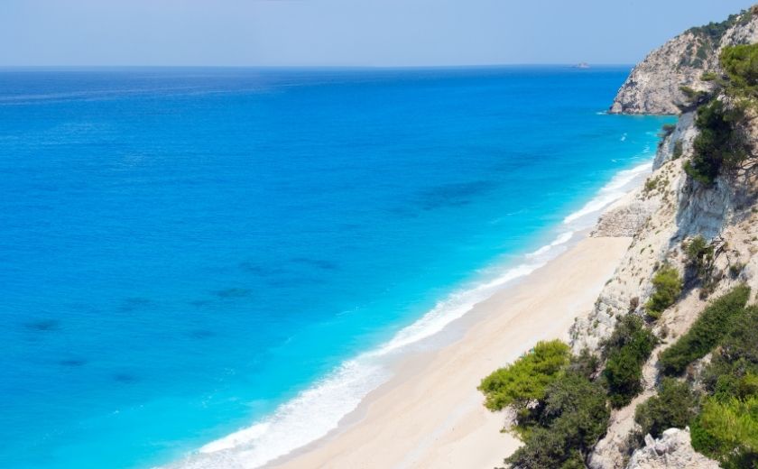 "Aerial view of Egremni Beach Lefkada with turquoise waters and white cliffs"
