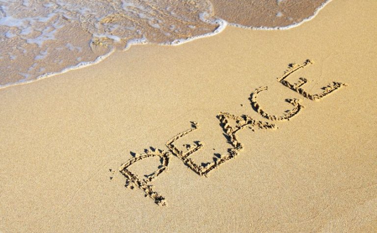 Anxious solo traveler relaxing by the beach in Lefkada