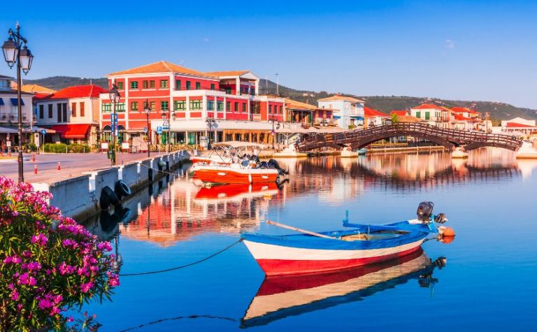Colorful fishing boats docked at the marina in Lefkada Town, Greece